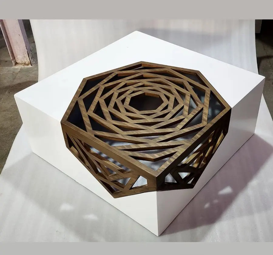 White centre table with a geometric wooden lattice top