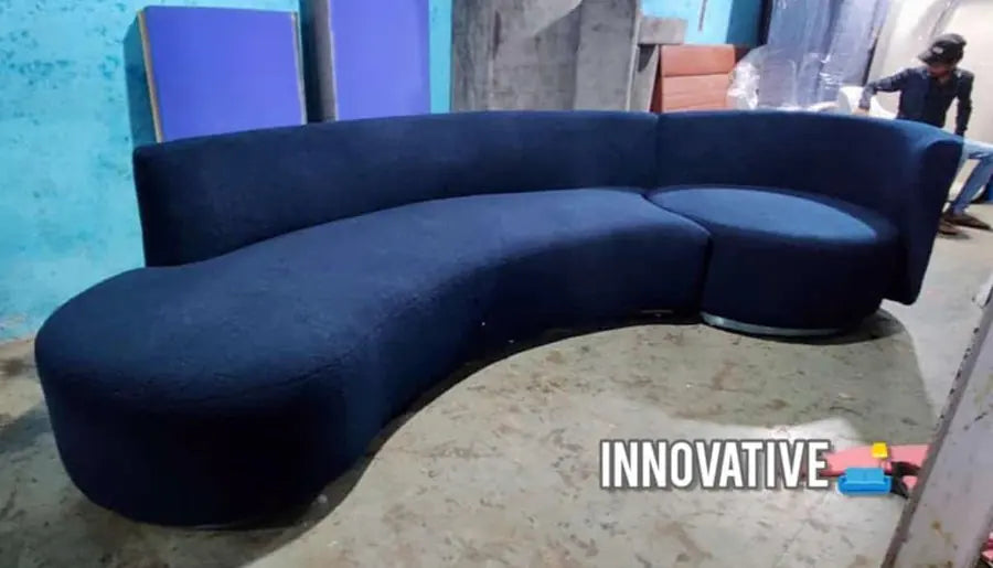 Navy velvet curved sofa