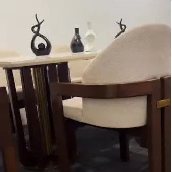Boucle dining chair with a wooden frame