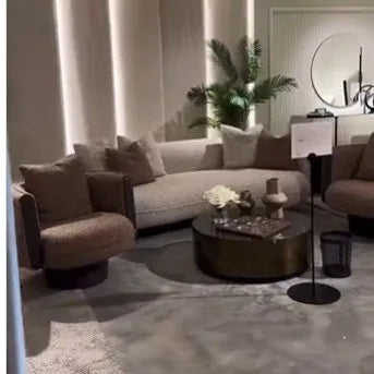 Living room with a round dark coffee table